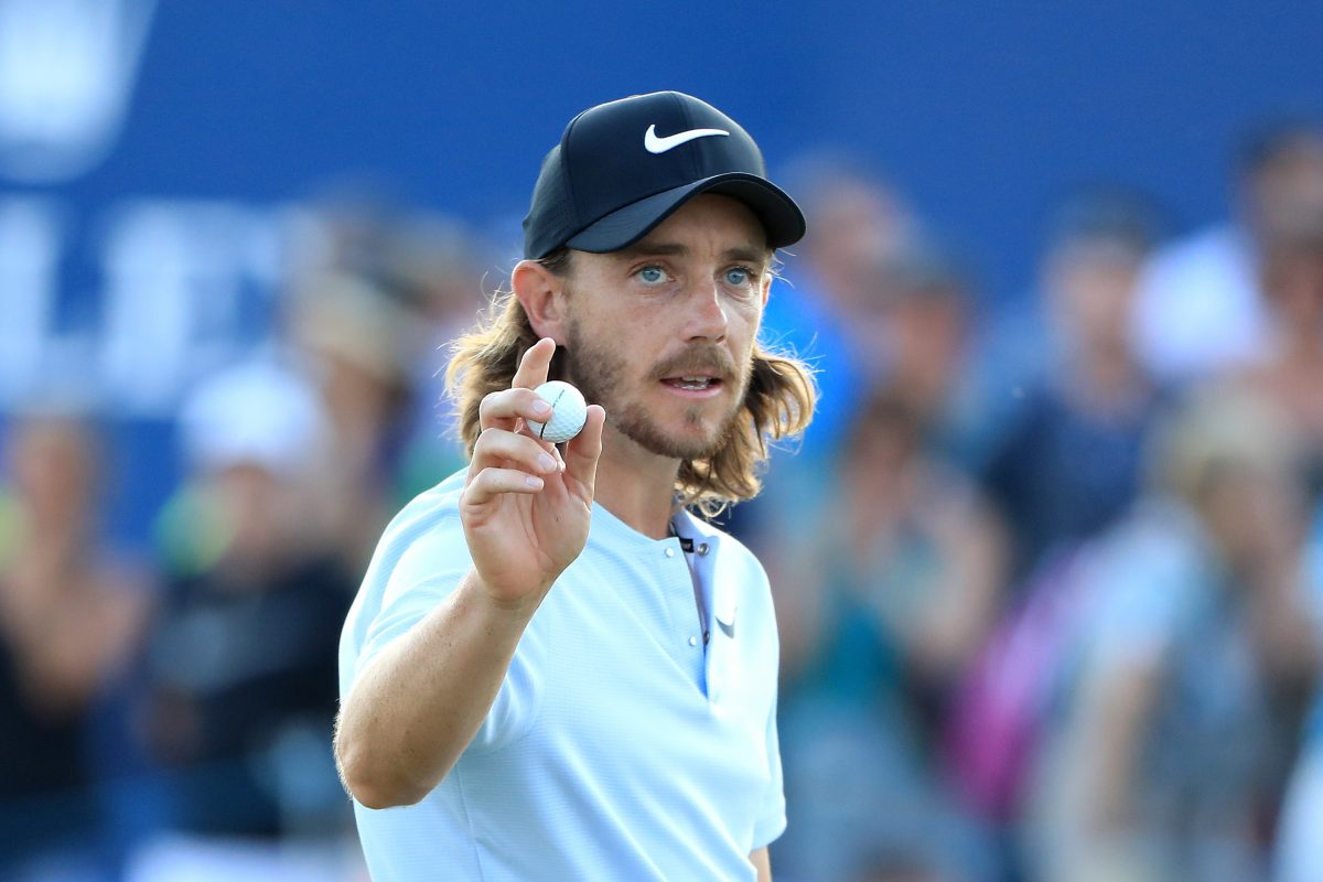 Tommy Fleetwood of England acknowledges the crowd on the 18th hole during the third round of the DP World Tour Championship at Jumeirah Golf Estates on November 18, 2017 in Dubai, United Arab Emirates. (Photo by Andrew Redington/Getty Images)