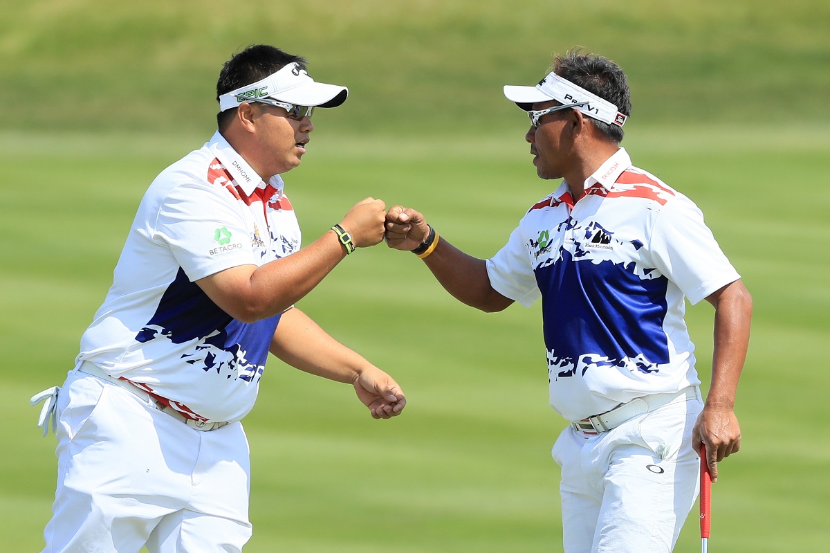 Kiradech Aphibarnrat and Thongchai Jaidee of Thailand celebrate a putt on the 6th green during the quarter final match between Thailand and Australia during day two of GolfSixes at The Centurion Club on May 7, 2017 in St Albans, England.  (Photo by Andrew Redington/Getty Images)
