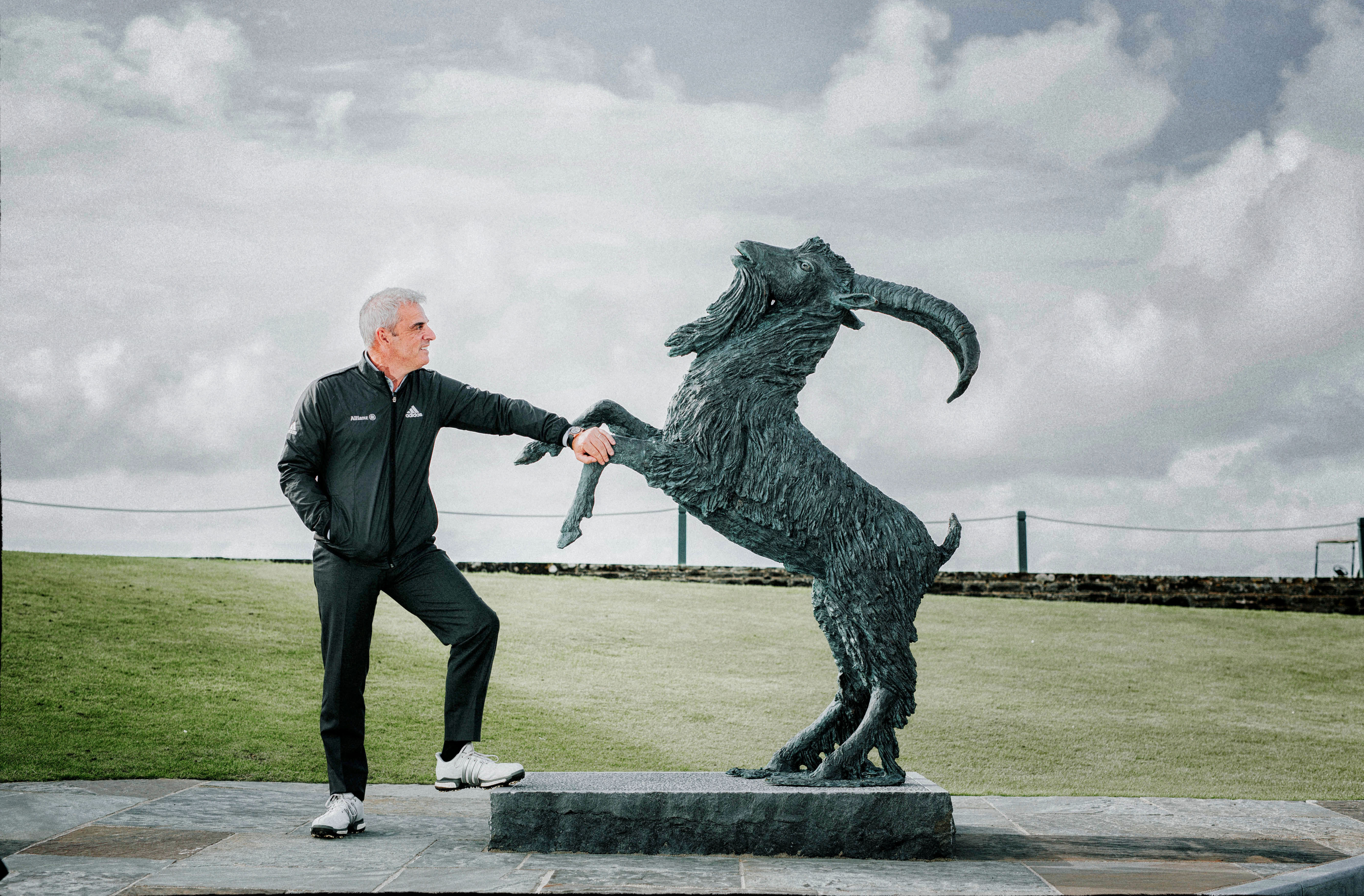 Paul McGinley with The Rampant Goat bronze at Lahinch Golf Club which was unveiled as part of the club's 125 year celebrations last year. © Lahinch Golf Club
