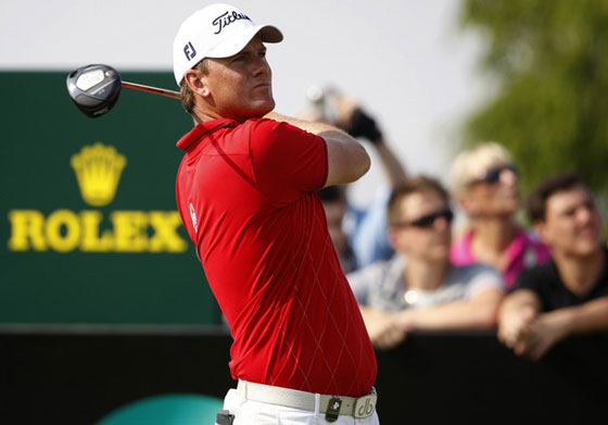 Robert Karlsson se ha impuesto en el Dubai World Championship tras derrotar a Poulter en el segundo hoyo de desempate.