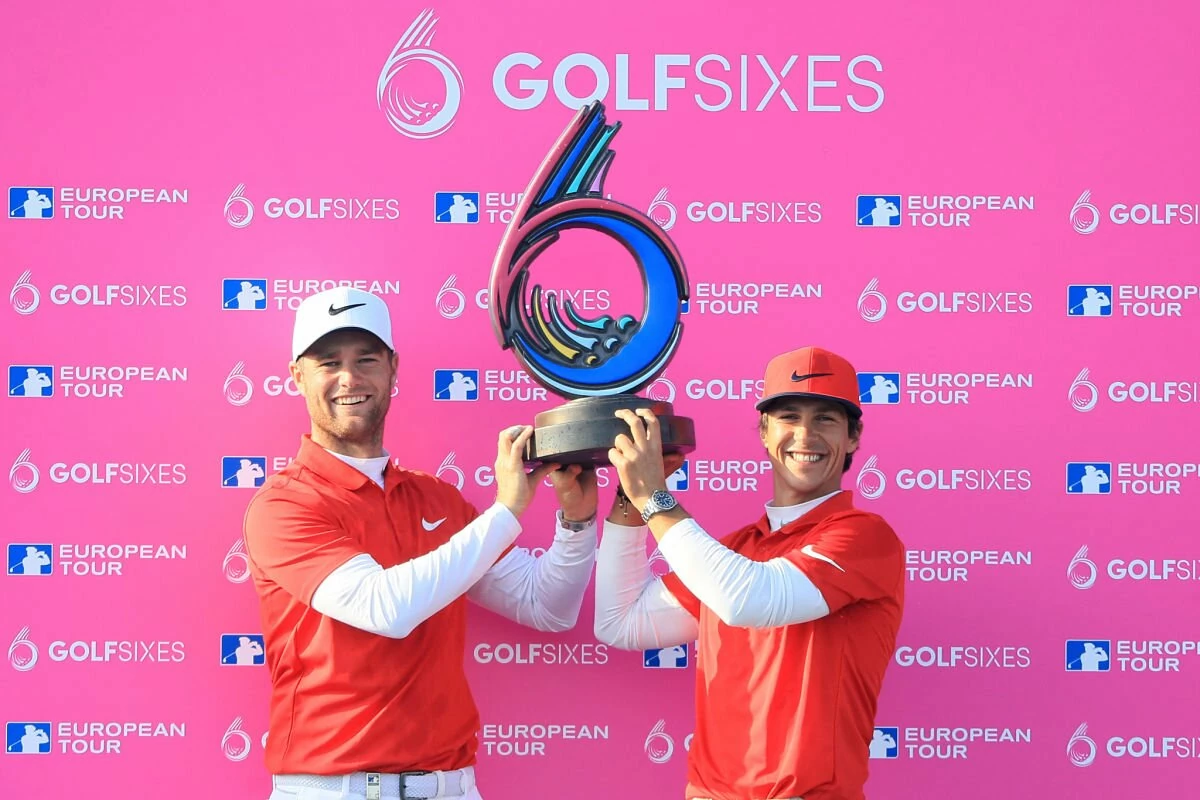 Thorbjorn Olesen and Lucas Bjerregaard of Denmark pose with the trophy after winning the final match between Denmark and Australia during day two of GolfSixes at The Centurion Club. © Getty Images