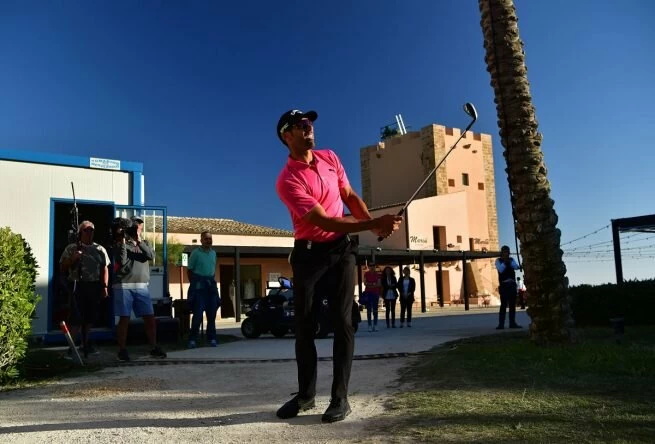 Alvaro Quiros plays a shot on the 18th hole during the third round of The Rocco Forte Open at The Verdura Golf and Spa Resort. © Getty Images | Stuart Franklin