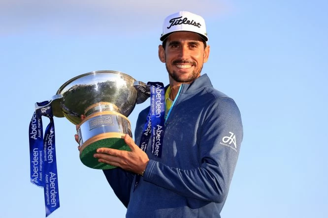 Rafa Cabrera Bello of Spain poses with the trophy following his victory on the 1st play off hole during the final round of the AAM Scottish Open at Dundonald Links Golf Course on July 16, 2017 in Troon, Scotland. (Photo by Andrew Redington/Getty Images)