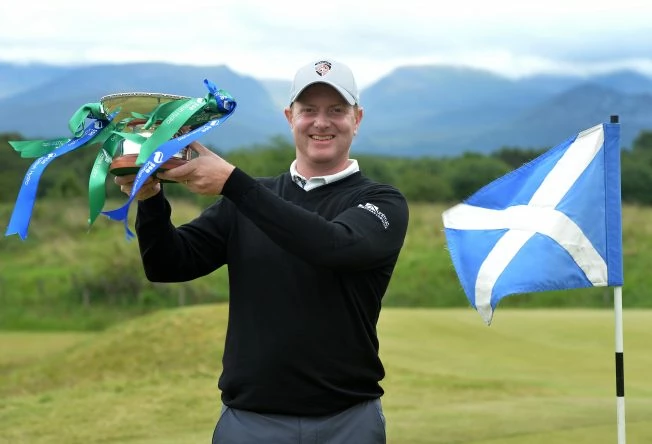Richard McEvoy of England poses with the trophy after winning the 2017 SSE Scottish Hydro Challenge hosted by MacDonald Hotels and Resorts. at Spey Valley Golf Course on July 2, 2017 in Aviemore, Scotland. (Photo by Mark Runnacles/Getty Images)