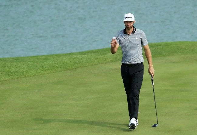 Dustin Johnson of the United States reacts on the second green during the second round of the WGC - HSBC Champions at Sheshan International Golf Club on October 27, 2017 in Shanghai, China. (Photo by Andrew Redington/Getty Images)