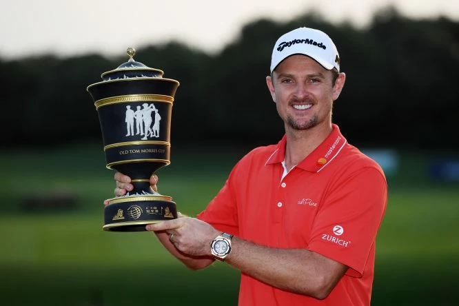 Justin Rose of England celebrates with the Old Tom Morris Cup after finishing 14 under to win the WGC - HSBC Champions at Sheshan International Golf Club on October 29, 2017 in Shanghai, China. (Photo by Ross Kinnaird/Getty Images)