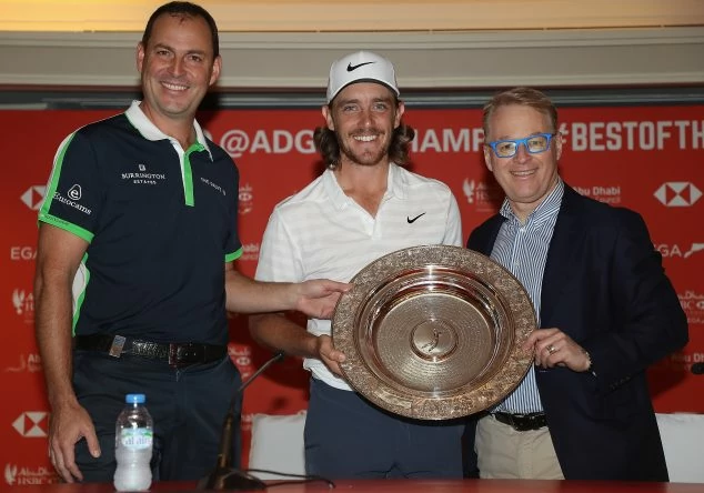 David Howell (L), European Tour Tournament Commitee, and Keith Pelley (R), CEO of the PGA European Tour present Tommy Fleetwood of England with the 'Seve Ballesteros Award' which is voted for by the players ahead of the Abu Dhabi HSBC Golf Championship at Abu Dhabi Golf Club on January 16, 2018 in Abu Dhabi, United Arab Emirates. (Photo by Matthew Lewis/Getty Images)