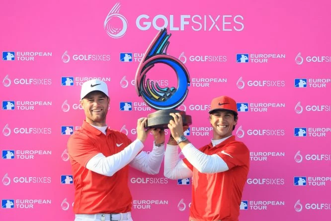 Thorbjorn Olesen and Lucas Bjerregaard of Denmark pose with the trophy after winning the final match between Denmark and Australia during day two of GolfSixes at The Centurion Club on May 7, 2017 in St Albans, England. (Photo by Andrew Redington/Getty Images)