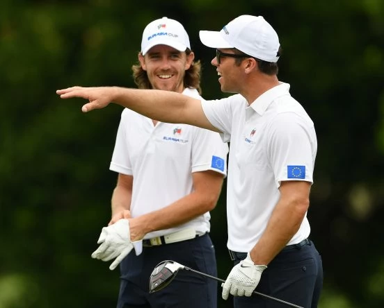 Paul Casey gestures to Tommy Fleetwood of Team Europe during practice prior to the start of the Eurasia Cup at Glenmarie G&CC on January 10, 2018 in Kuala Lumpur, Malaysia. (Photo by Stuart Franklin/Getty Images)