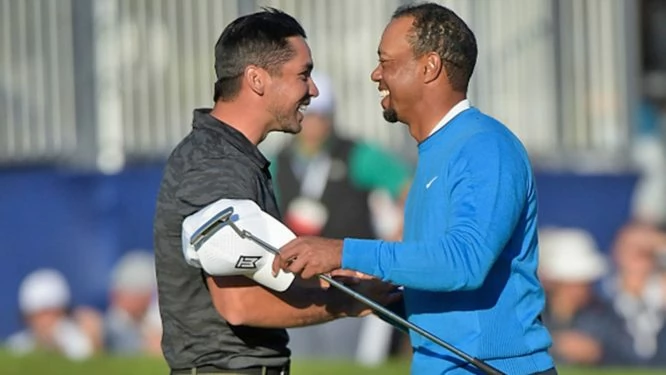 Jason Day y Tiger Woods, saludándose © PGA Tour