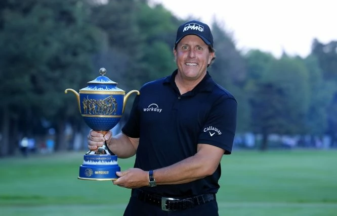 Phil Mickelson of the United States holds the Gene Sarazen Trophy after his play-off win during the final round of the World Golf Championships-Mexico Championship at the Club de Golf Chapultepec on March 4, 2018 in Mexico City, Mexico. (Photo by David Cannon/Getty Images)