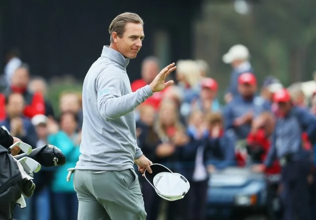 Nicolas Colsaerts of Belgium acknowledges the crowds after winning his match against Richie Ramsay of Scotland during the knockout stage on day three of the Belgian Knockout at Rinkven International Golf Club on May 19, 2018 in Antwerpen, Belgium. (Photo by Warren Little/Getty Images)
