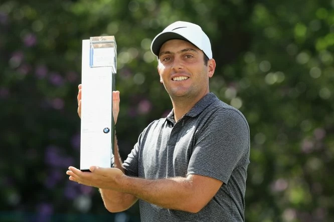 Francesco Molinari of Italy holds the trophy after winning the BMW PGA Championship at Wentworth on May 27, 2018 in Virginia Water, England. (Photo by Andrew Redington/Getty Images)