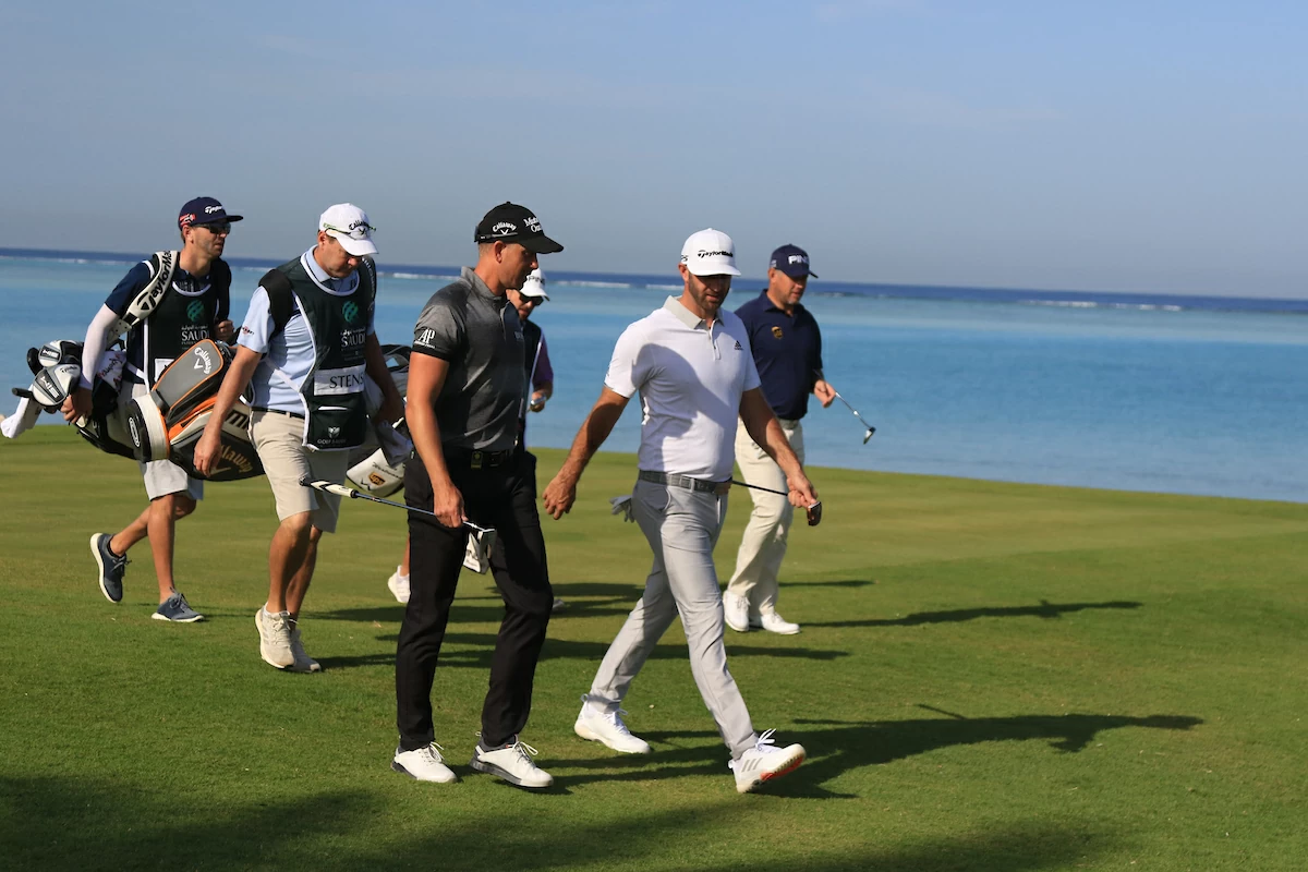Henrik Stenson, Dustin Johnson y Lee Westwood durante la primera jornada del Saudi International. © Golffile | Thos Caffrey