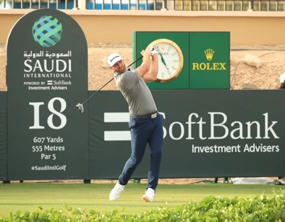 Dustin Johnson of The United States of America tees off on the 18th hole during Day 2 of the Saudi International at Royal Greens Golf and Country Club on January 31, 2020 in King Abdullah Economic City, Saudi Arabia. (Photo by Andrew Redington/WME IMG/WME IMG via Getty Images)