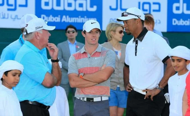 Mark O'Meara, Rory McIlroy y Tiger Woods en el Emirates Golf Club en 2014. © Golffile | Eoin Clarke