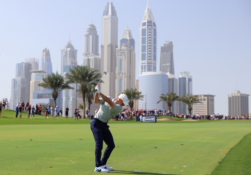 Rory McIlroy of Northern Ireland hits his second shot on the 8th hole during day three of the Slync.io Dubai Desert Classic at Emirates Golf Club on January 29, 2022 in Dubai, United Arab Emirates. (Photo by Warren Little/Getty Images)