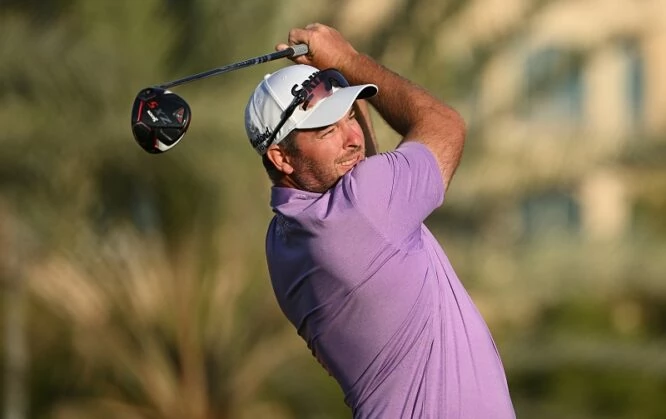 Ryan Fox of New Zealand tees off the third hole during day two of the Ras Al Khaimah Classic at Al Hamra Golf Club on February 11, 2022 in Ras al Khaimah, United Arab Emirates. (Photo by Ross Kinnaird/Getty Images)