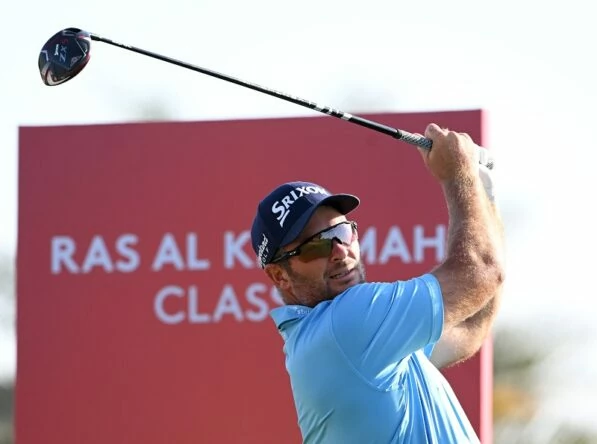 Ryan Fox of New Zealand plays his tee shot on the ninth hole during day one of the Ras Al Khaimah Classic at Al Hamra Golf Club on February 10, 2022 in Ras al Khaimah, United Arab Emirates. (Photo by Ross Kinnaird/Getty Images)
