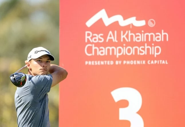 Nicolai Hojgaard of Denmark plays his tee shot on the third hole during day three of the Ras al Khaimah Championship presented by Phoenix Capital at Al Hamra Golf Club on February 05, 2022 in Ras al Khaimah, United Arab Emirates. (Photo by David Cannon/Getty Images)