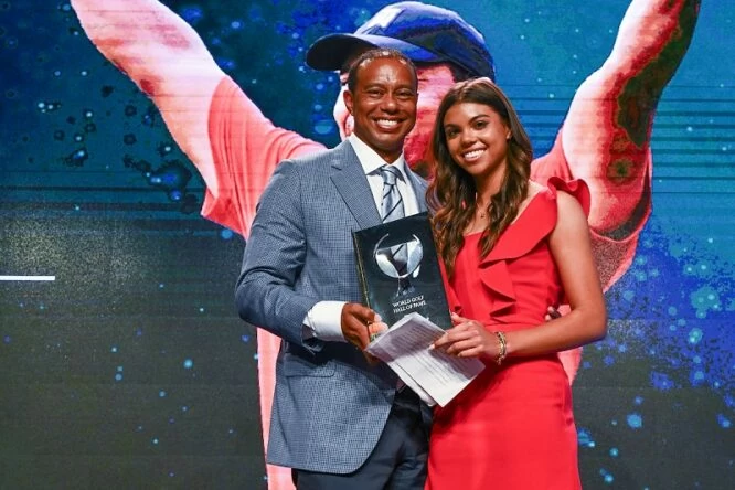 Tiger Woods and his daughter Sam, pose on stage during the World Golf Hall of Fame Induction Ceremony prior to THE PLAYERS Championship at PGA TOUR Global Home on March 9, 2022, in Ponte Vedra Beach, FL. (Photo by Chris Condon/PGA TOUR)