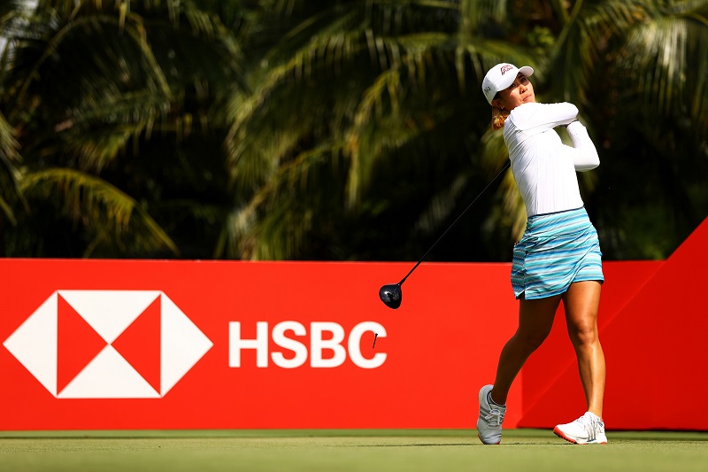 Danielle Kang of the United States plays her shot from the second tee during the first round of the HSBC Women's World Championship at Sentosa Golf Club on March 03, 2022 in Singapore. (Photo by Yong Teck Lim/Getty Images)