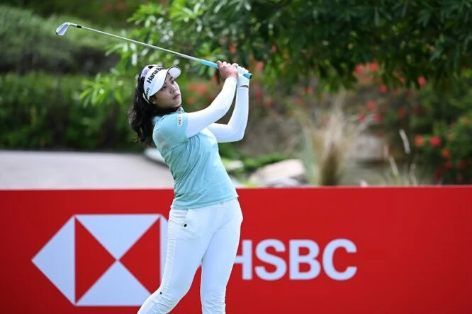 Patty Tavatanakit of Thailand tees off on the seventh hole during the First Round of the HSBC Women's World Championship at Sentosa Golf Club on March 03, 2022 in Singapore. (Photo by Ross Kinnaird/Getty Images)