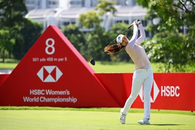 In Gee Chun of South Korea tees off on the eighth hole during the Third Round of the HSBC Women's World Championship at Sentosa Golf Club on March 05, 2022 in Singapore. (Photo by Ross Kinnaird/Getty Images)