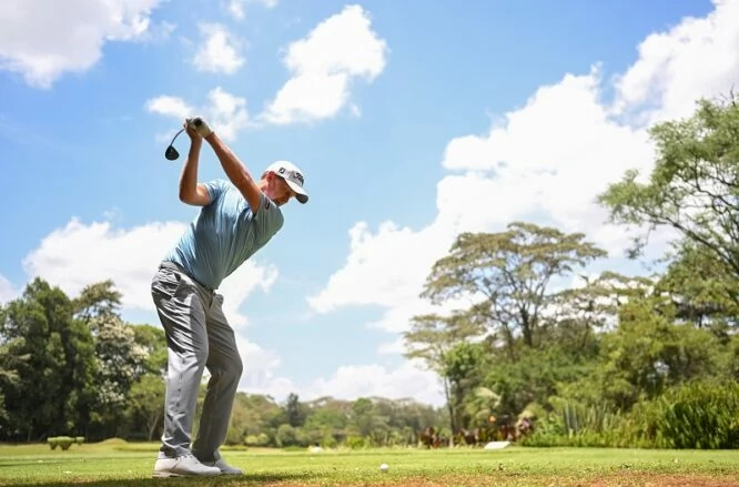 ustin Harding of South Africa plays a shotduring a practice round prior to the Magical Kenya Open at Muthaiga Golf Club on March 01, 2022 in Nairobi, Kenya. (Photo by Stuart Franklin/Getty Images)