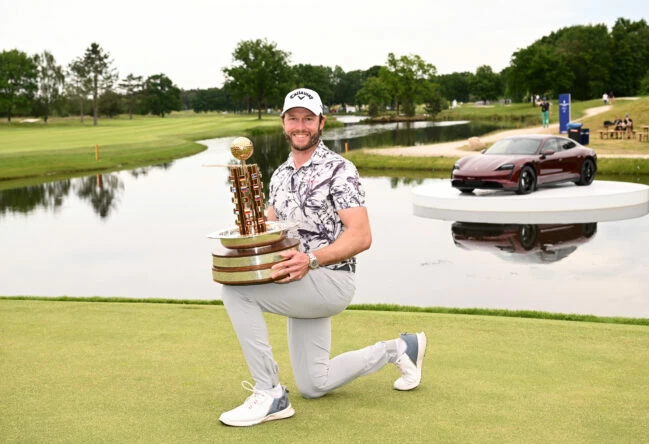 Kalle Samooja of Finland poses with the trophy as he finishes his round -8 for the day and wins the Porsche European Open at Green Eagle Golf Course on June 5, 2022 in Hamburg, Germany. (Photo by Stuart Franklin/Getty Images)
