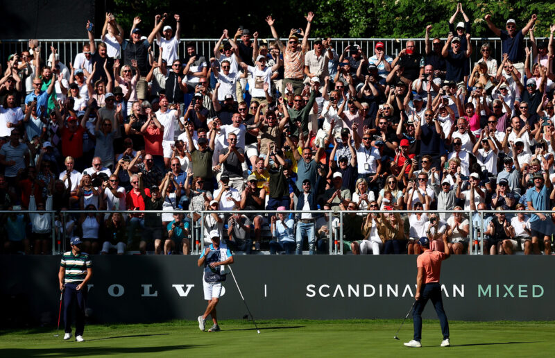 Henrik Stenson of Sweden celebrates with the stands packed full of fans after a birdie putt on the 16th green during Day Three of the Volvo Car Scandinavian Mixed Hosted by Henrik & Annika at Halmstad Golf Club on June 11, 2022 in Halmstad, Sweden. (Photo by Naomi Baker/Getty Images)