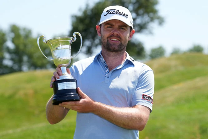 Liam Johnston of Scotland receives the trophy after victory in the Emporda Challenge at Emporda Golf Club on June 12, 2022 in Girona, Spain. (Photo by Alex Caparros/Getty Images)