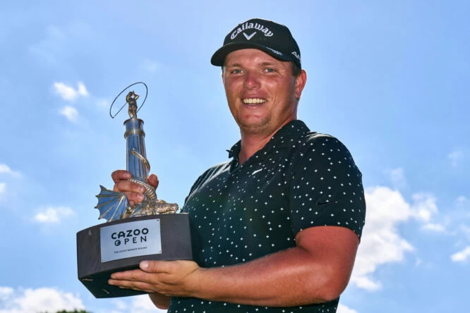 Callum Shinkwin of England poses for a photograph with the Cazoo Open Trophy after defeating Connor Syme of Scotland ( not pictured ) to win the Cazoo Open during day four of the Cazoo Open at Celtic Manor Resort on August 07, 2022 in Newport, Wales. (Photo by Angel Martinez/Getty Images)
