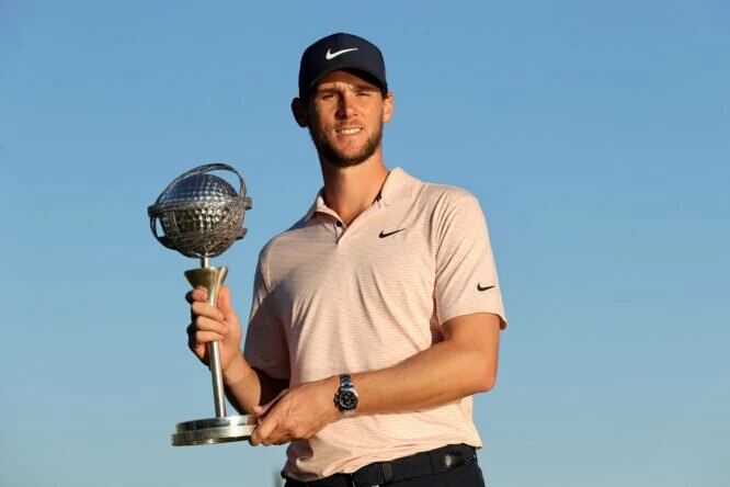 Thomas Pieters of Belgium celebrates with the winners trophy after the final round of the Portugal Masters at Dom Pedro Victoria Golf Course on November 07, 2021 in Quarteira, Portugal. (Photo by Warren Little/Getty Images)