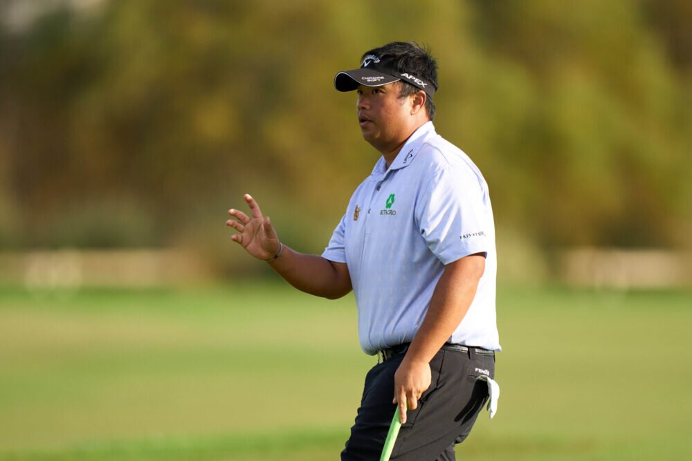 Kiradech Aphibarnrat of Thailand acknowledges the audience on the 18th hole during the Day Five of the Final Stage of Qualifying School at Lakes Course, Infinitum on November 15, 2022 in Tarragona, Spain. (Photo by Angel Martinez/Getty Images)