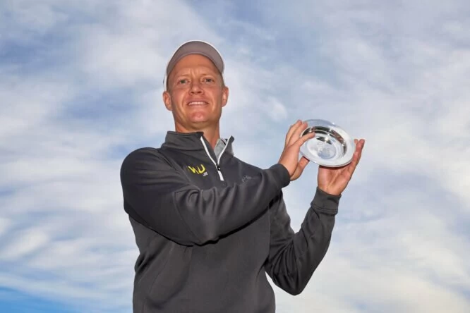 Simon Forsstrom of Sweden poses with the trophy after victory during the Day Six of the Final Stage of Qualifying School at Lakes Course, Infinitum on November 16, 2022 in Tarragona, Spain. (Photo by Angel Martinez/Getty Images)