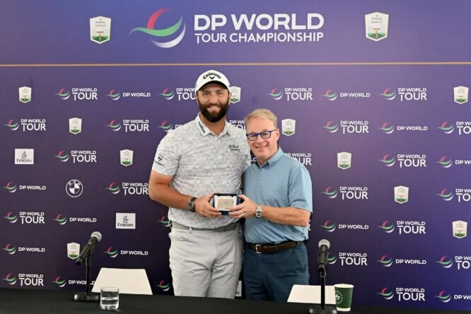 Jon Rahm of Spain receives the honorary life membership to the DP World Tour from the CEO of The European Tour Group Keith Pelley prior to the DP World Tour Championship on the Earth Course at Jumeirah Golf Estates on November 16, 2022 in Dubai, United Arab Emirates. (Photo by Ross Kinnaird/Getty Images)