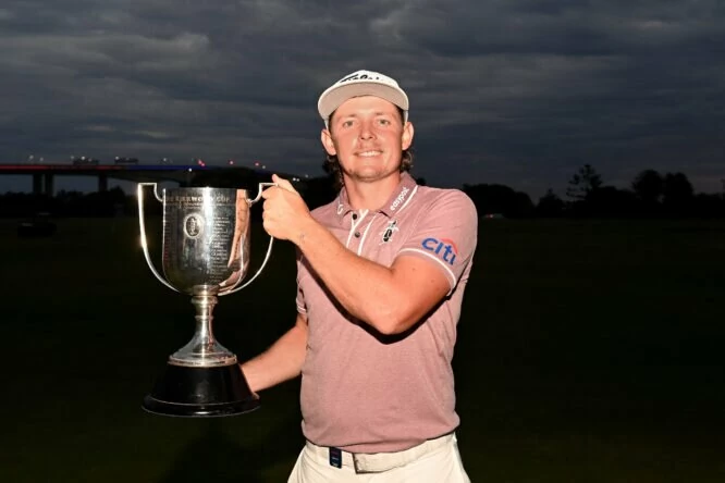 Cameron Smith of Australia celebrates victory as he holds the Kirkwood Cup during Day 4 of the 2022 Australian PGA Championship at the Royal Queensland Golf Club on November 27, 2022 in Brisbane, Australia. (Photo by Bradley Kanaris/Getty Images)