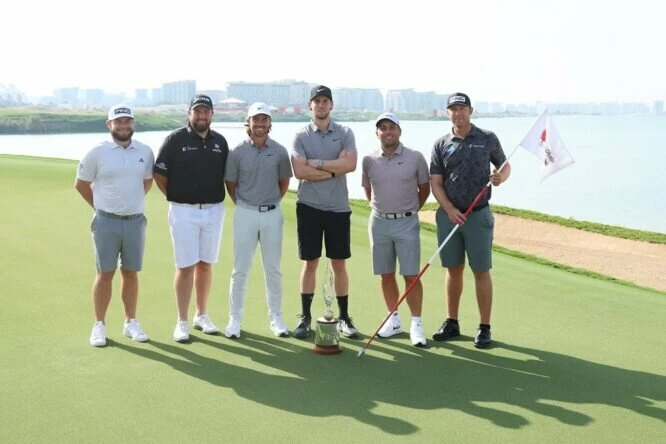 Tyrrell Hatton of England, Shane Lowry of Ireland, Tommy Fleetwood of England, Thomas Pieters of Belgium, Francesco Molinari of Italy, and Seamus Power of Ireland pose for a photo prior to the Abu Dhabi HSBC Championship at Yas Links Golf Course on January 17, 2023 in Abu Dhabi, United Arab Emirates. (Photo by Andrew Redington/Getty Images)