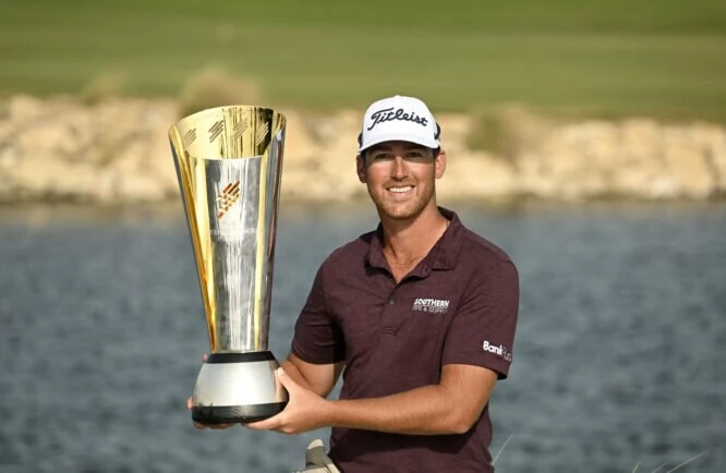 Andy Ogletree of the USA pictured with the winner’s trophy during Round Four on Sunday February 19, 2023 at the US$2.5 million International Series Qatar at Doha Golf Club, Doha, Qatar. The tournament is being held from February 16-19, 2023. Picture by Paul Lakatos/Asian Tour