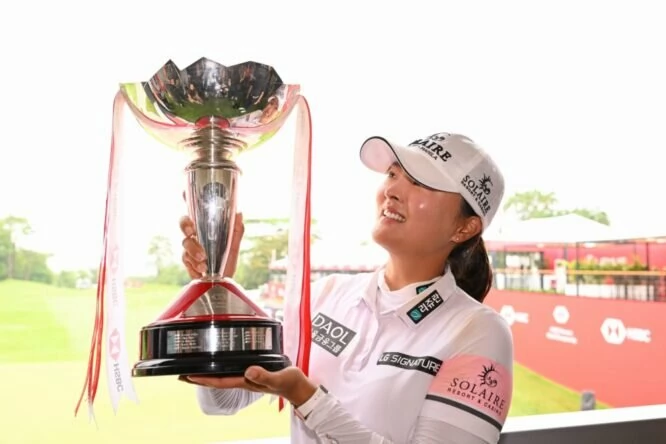 Jin Young Ko of South Korea poses with the trophy after winning the HSBC Women's World Championship during Day Four of the HSBC Women's World Championship at Sentosa Golf Club on March 05, 2023 in Singapore. (Photo by Ross Kinnaird/Getty Images)