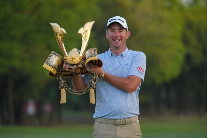 Lucas Herbert of Australia poses with the trophy at the award ceremony following day four of the ISPS Handa - Championship at PGM Ishioka GC on April 23, 2023 in Omitama, Ibaraki, Japan. (Photo by Yoshimasa Nakano/Getty Images)
