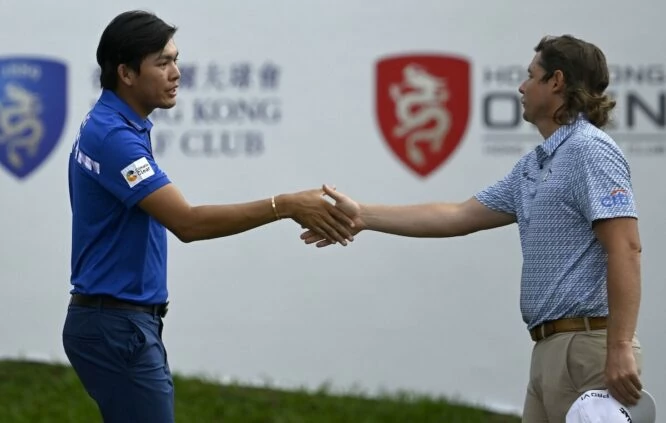 Phachara Khongwatmai of Thailand and Cameron Smith of Australia pictured shaing hands on the 18th green on Saturday November 11, 2023 during Round Three of the Hong Kong Open at the Hong Kong Golf Club. The US$ 2 million Asian Tour event is staged from November 9-12, 2023. Picture by Paul Lakatos/Asian Tour.