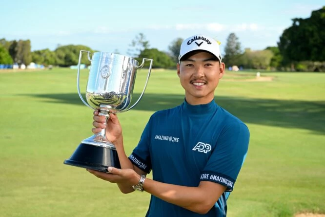 Min Woo Lee celebrates victory with the Kirkwood Cup during day four of the 2023 Australian PGA Championship at Royal Queensland Golf Club on November 26, 2023 in Brisbane, Australia. (Photo by Bradley Kanaris/Getty Images)