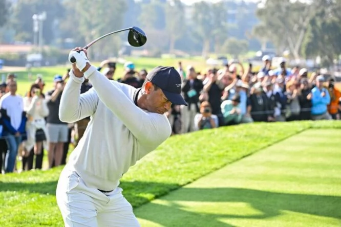 Tiger Woods at the top of his swing as he plays his shot from the third hole tee during the first round of The Genesis Invitational at Riviera Country Club on February 15, 2024 in Pacific Palisades, California. (Photo by Ben Jared/PGA TOUR via Getty Images)