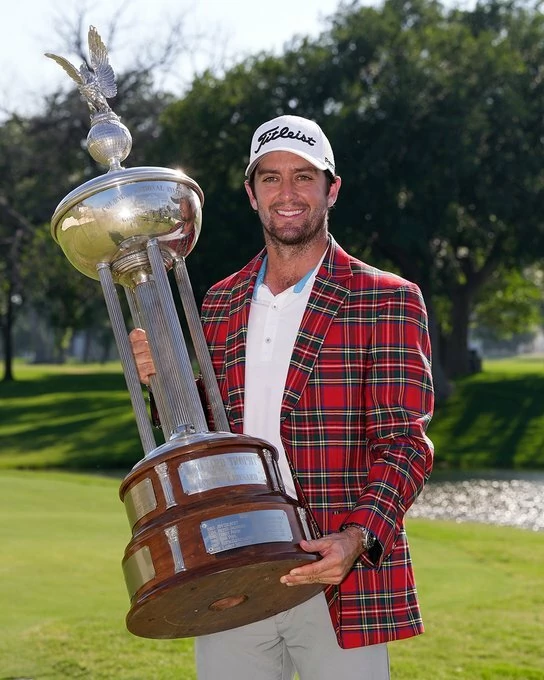 Davis Riley poses with the 2024 Charles Schwab Challenge winner's trophy. © PGA Tour Davis Riley poses with the 2024 Charles Schwab Challenge winner's trophy. © PGA Tour
